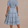 Wholesale Floral Short Sleeve High Ruffle Neck Smocked Tiered Midi Dress Blue