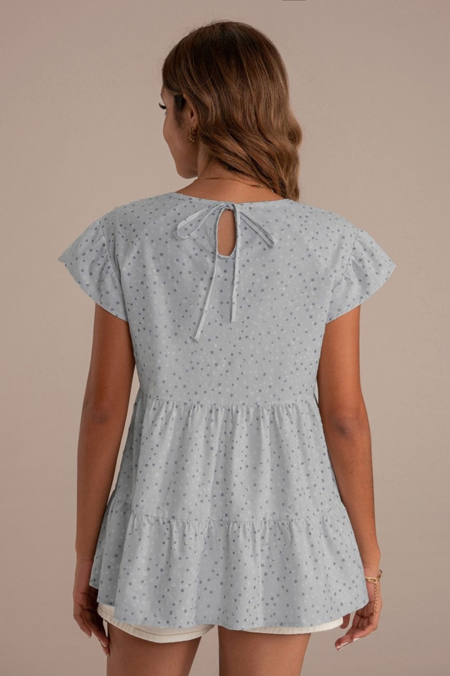 Wholesale Dot Textured Print Ruffled Round Neck Top Baby Blue